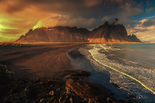 serene beauty of majestic mountains meeting the tranquil seafront in